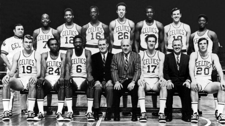 Bill Russell leads Celtics to 11th title in 13 seasons.